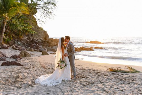Puerto Vallarta Beach Wedding photo of couple kissing on the beach at Villa Verano.